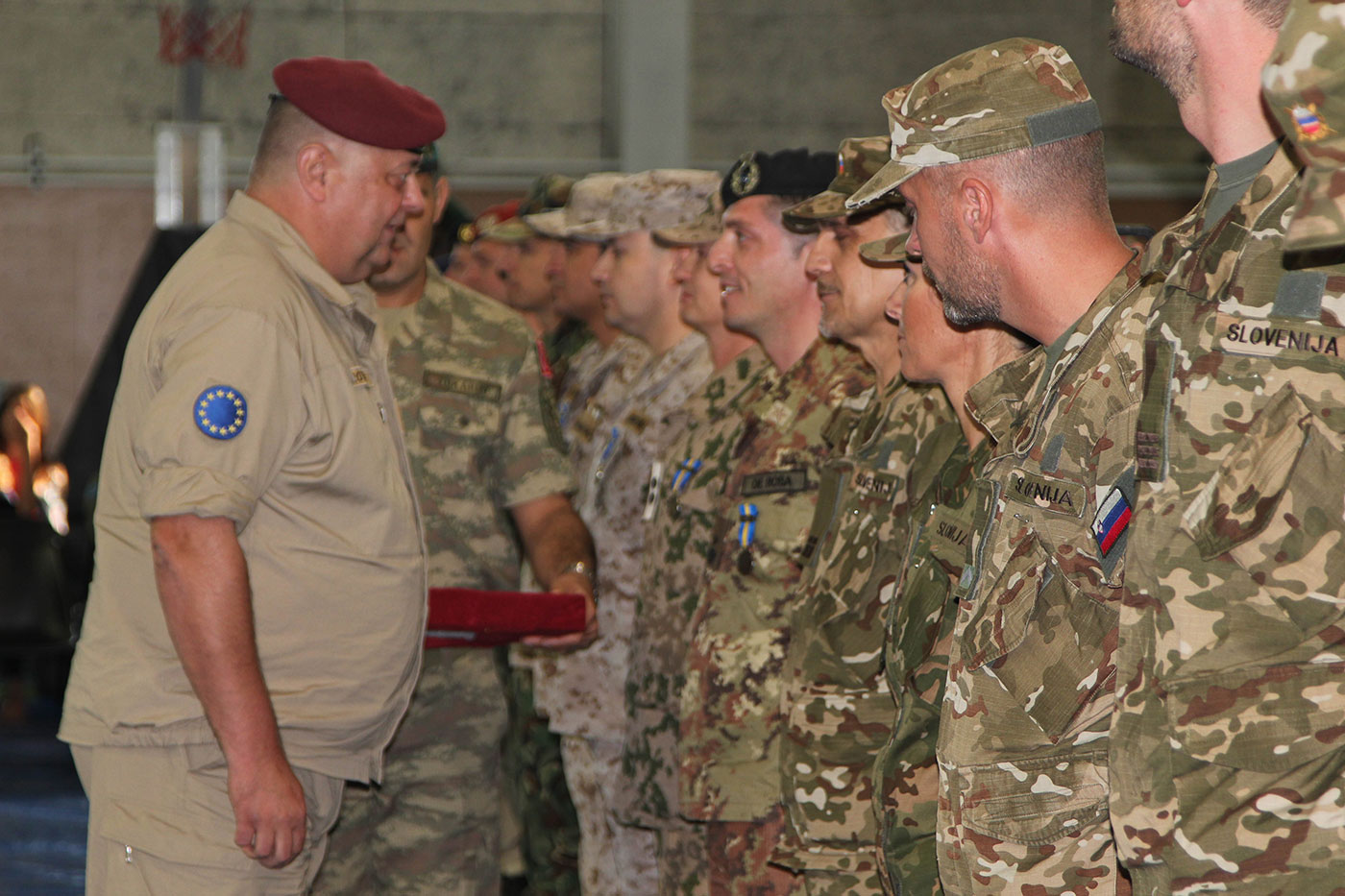 COM EUFOR, Major General Friedrich Schrötter presents the EUFOR Op ALTHEA medal to EUFOR soldiers.