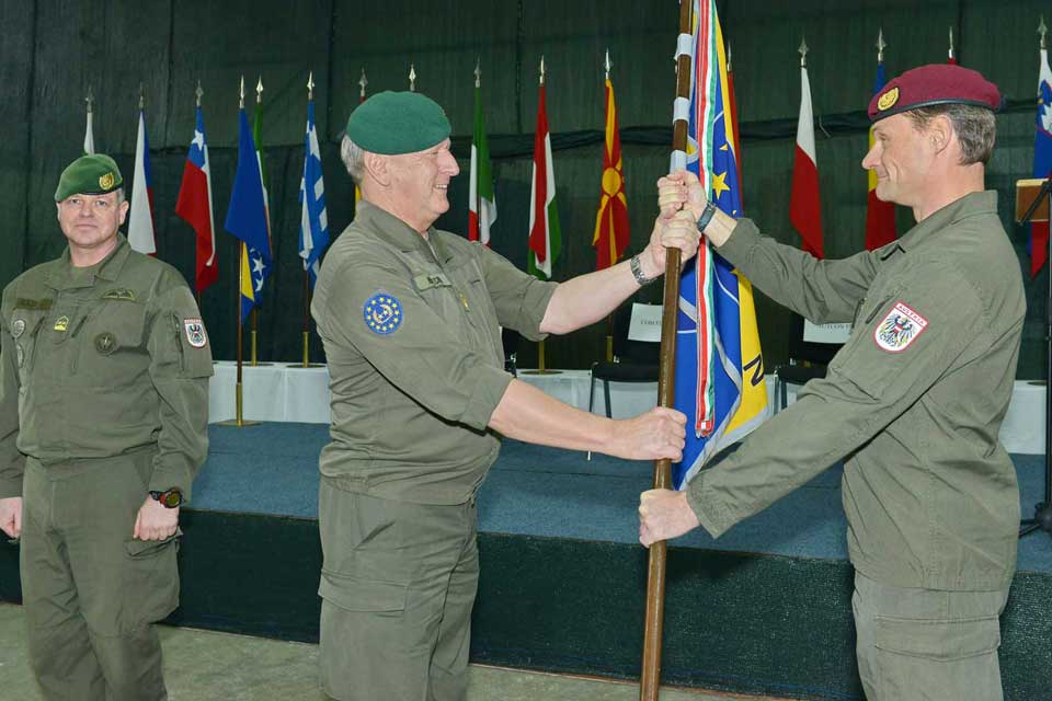 Major General Dieter Heidecker hands over the flag to the new commander Lieutnant Colonell Harald Scharf